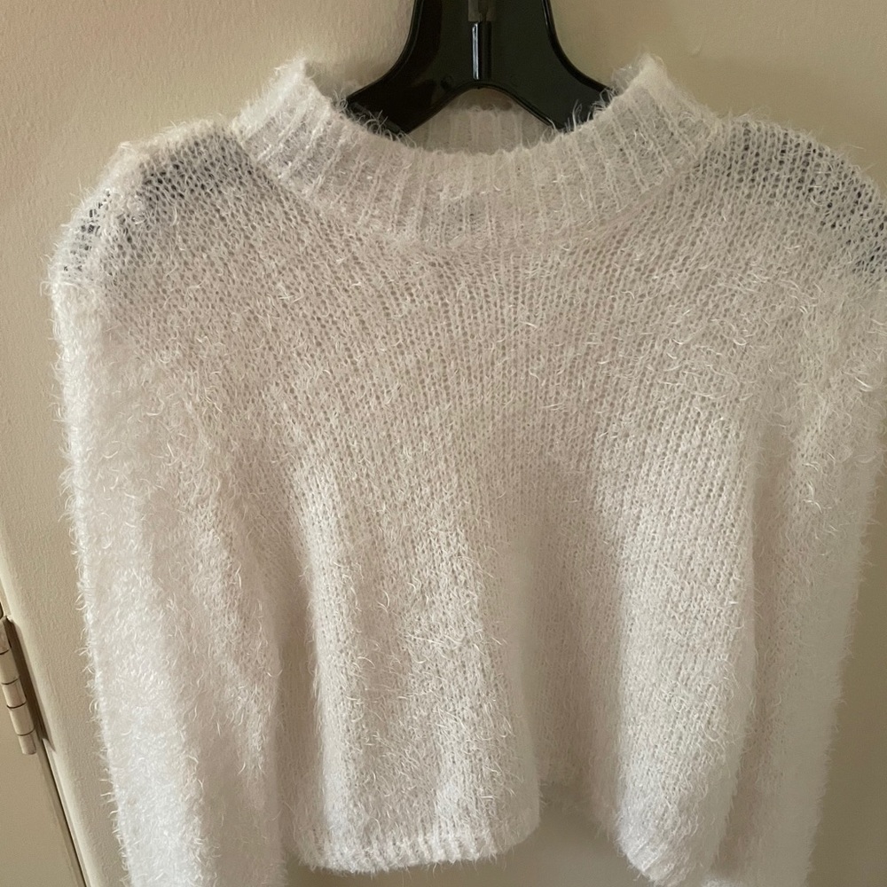 white fuzzy sweater